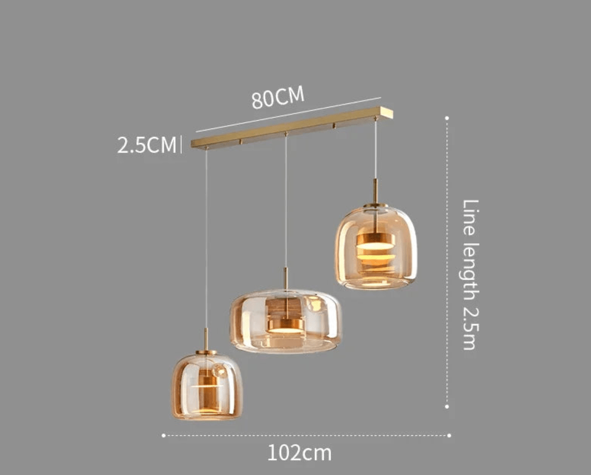 3 TÊTES BASE LIGNE / AMBRÉ / LUMIÈRE BLANCHE Lustres design en verre