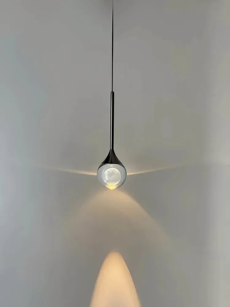Suspension boule de verre design lunaire